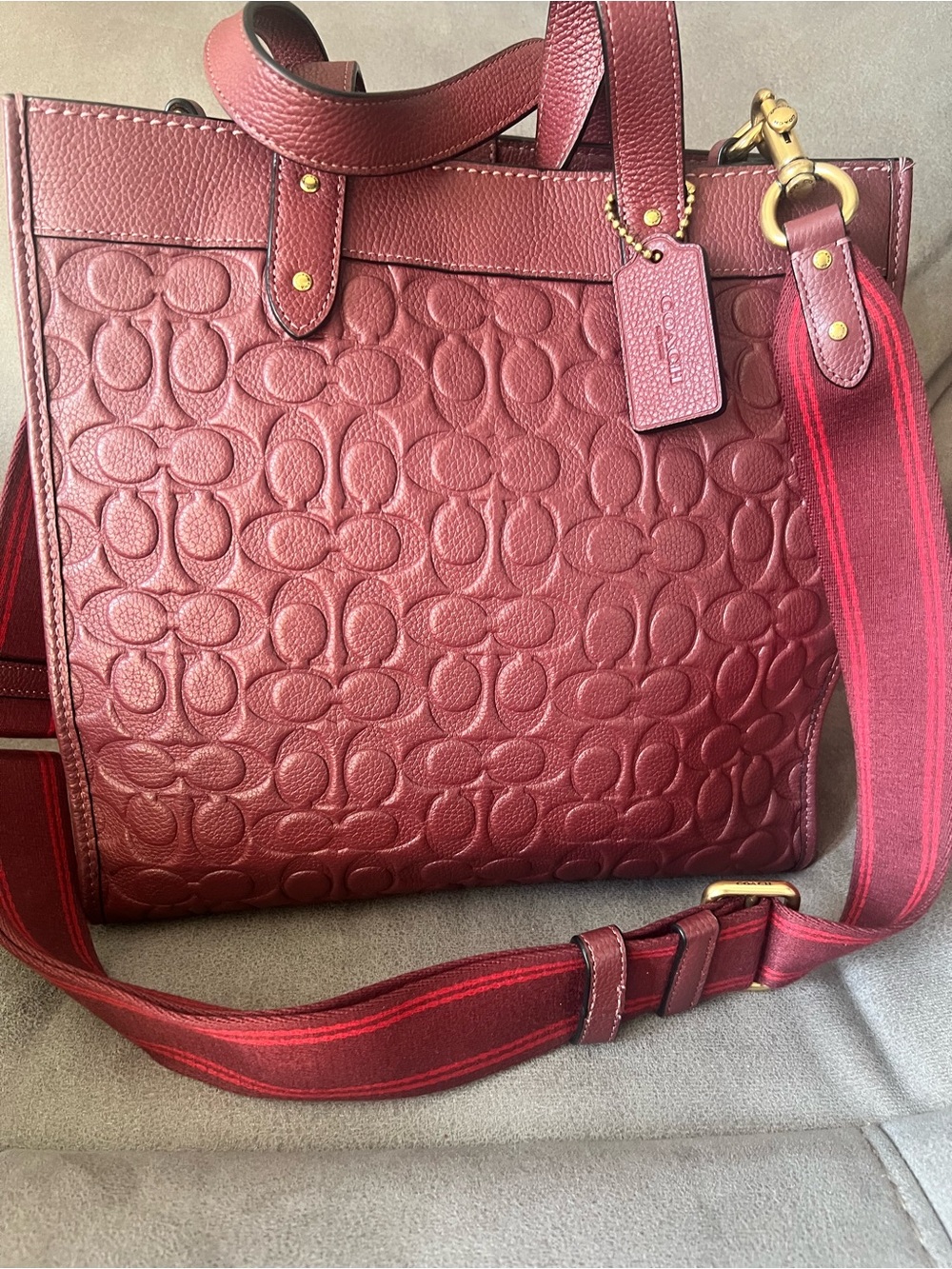 Coach Burgundy Embossed Signature Tote with Red Strap